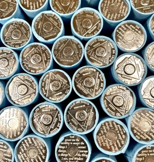 Sober Medallions aluminum token detail emphasizes durable material.