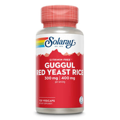 Solaray Guggul Gum Extract bottle and capsules suggesting cardiovascular support potential