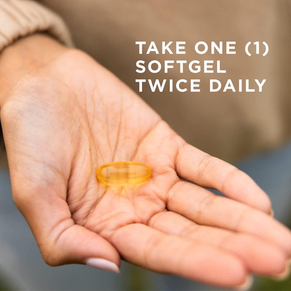Solgar Omega-3 950 mg softgel capsules close-up showing golden oil.