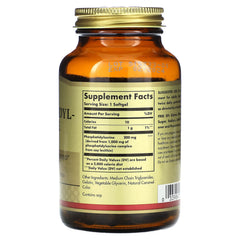 Solgar softgels in hand for easy daily brain health support.