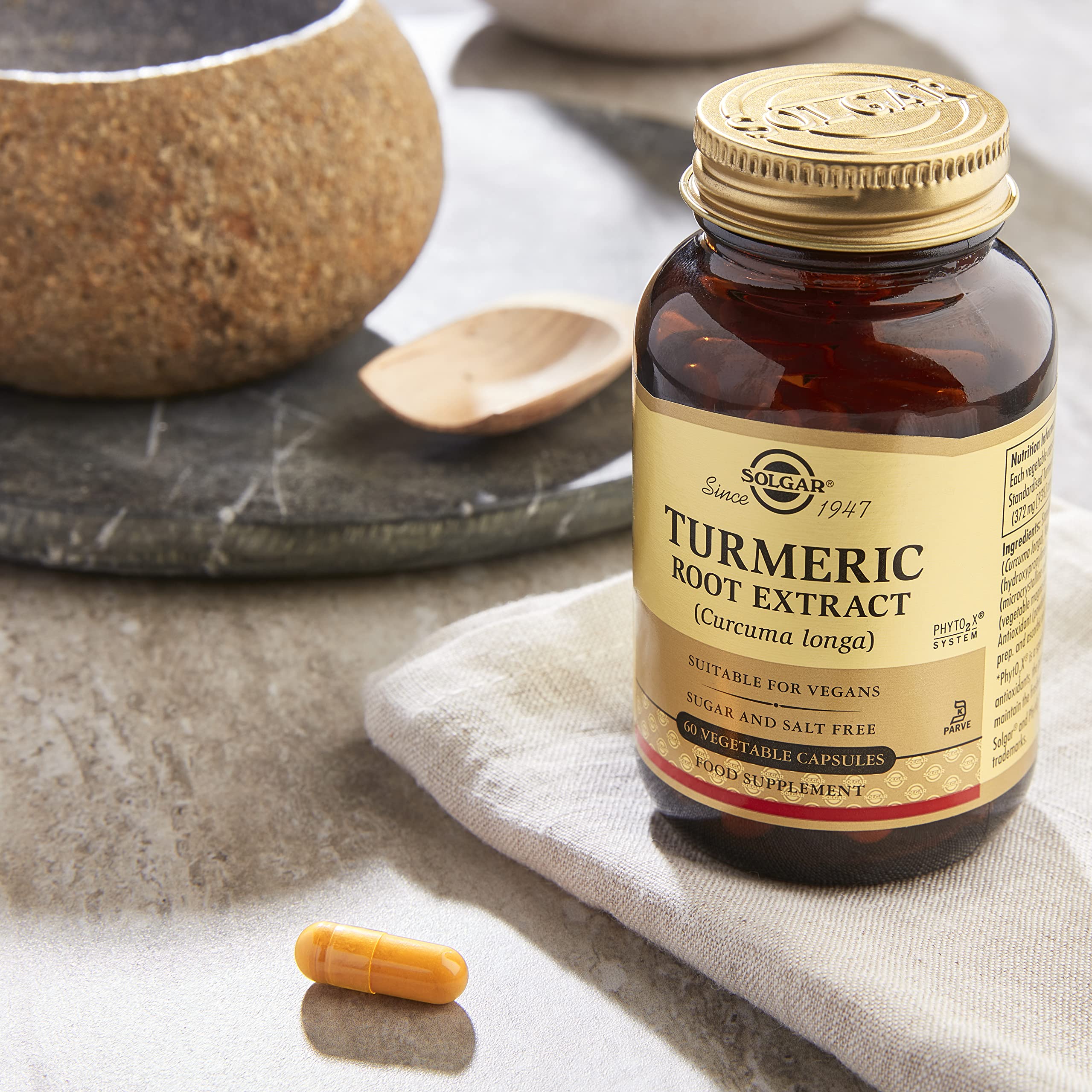 Solgar capsules pictured beside morning routine items for daily use.
