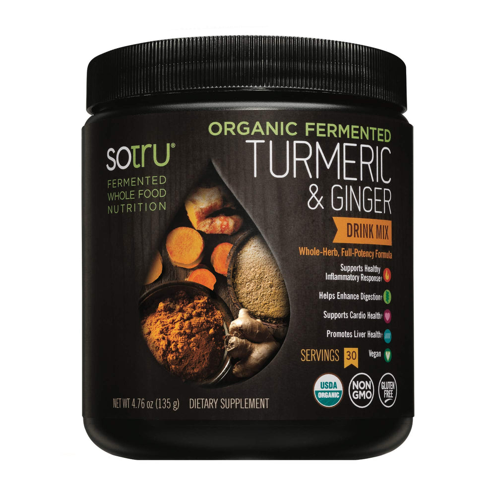 Spoon stirring PlantFusion powder into water for easy post-workout recovery.