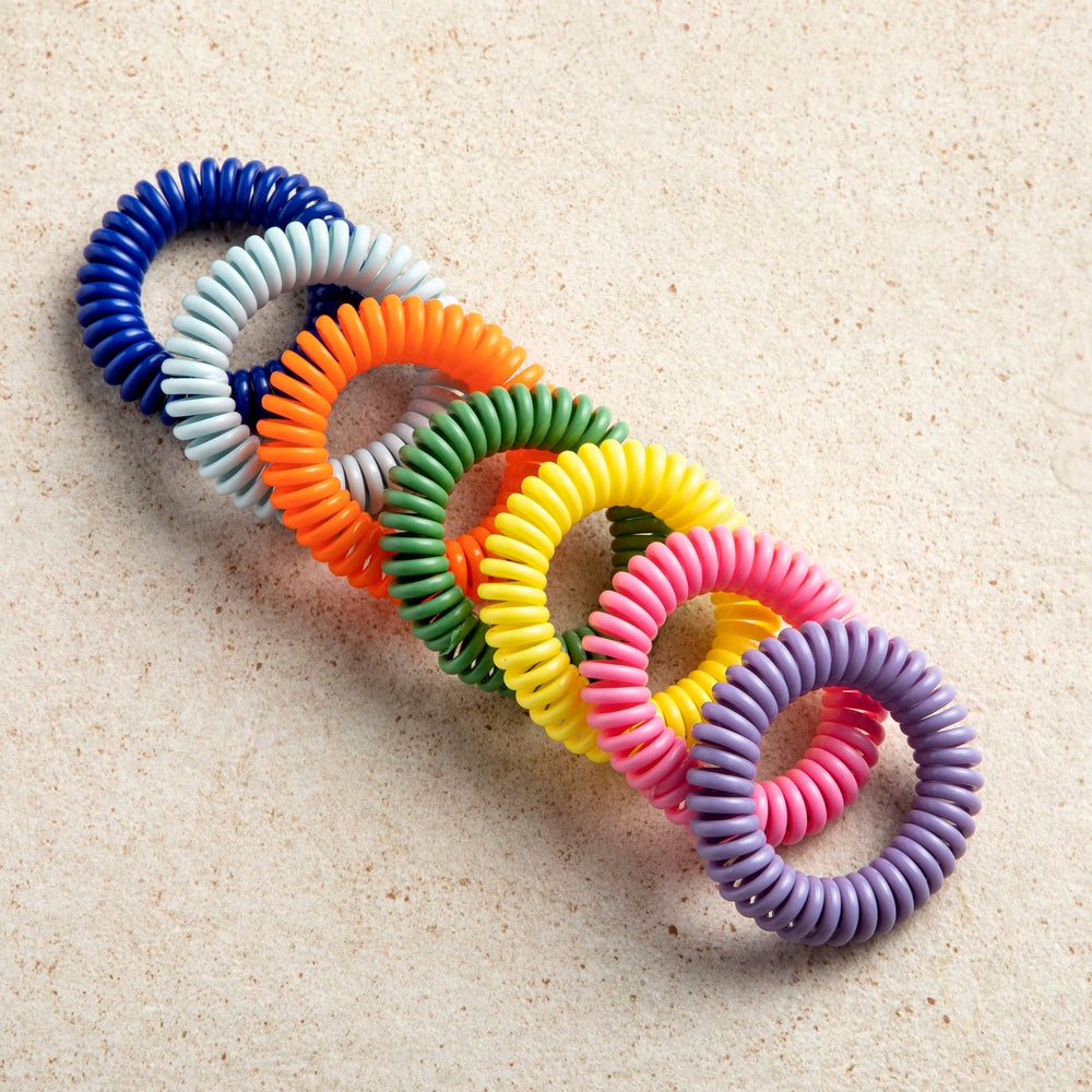 SoulSation bracelets on kids and adults for outdoor use.