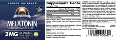 Source Naturals Melatonin bottle on nightstand suggests simple nightly routine.