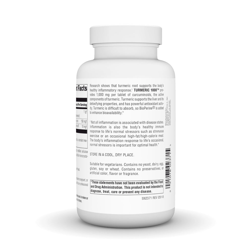 Source Naturals Turmeric 1000 tablets pictured with a meal to suggest taking with food.