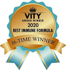 Source Naturals Wellness Formula capsules poured into hand for daily routine.