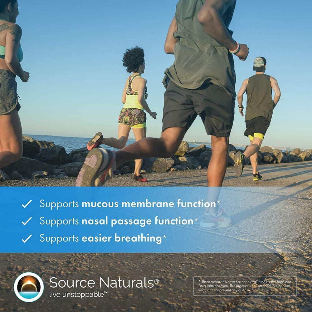 Source Naturals Wellness Formula packaging box on kitchen counter.