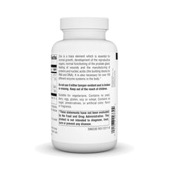 Source Naturals zinc tablets poured into hand illustrate easy daily supplementation.