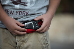 SPIbelt Diabetic Belt pass-through tubing keeps cords tidy during activities.