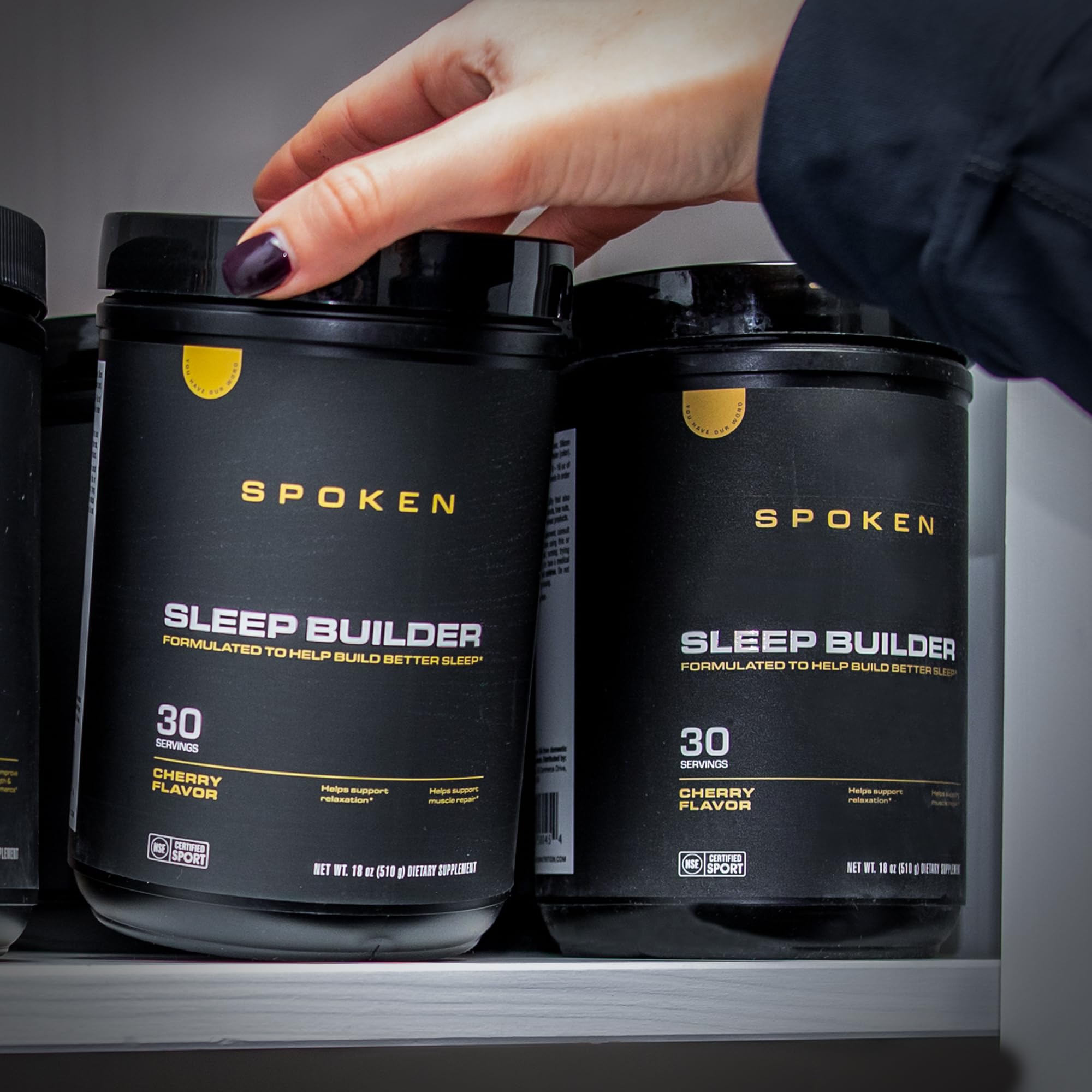 Spoken Nutrition Sleep Builder serving scoop ready to mix for sleep support.