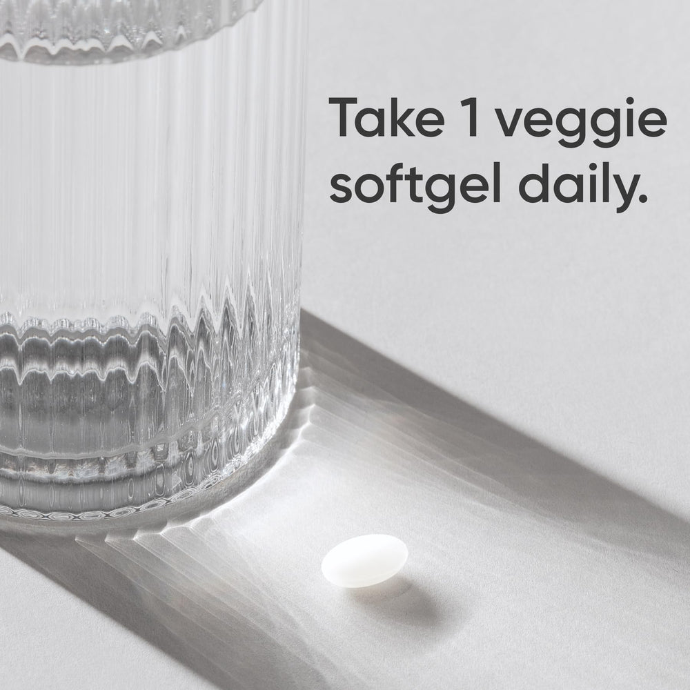 Sports Research Biotin 10,000mcg capsule closeup supports plant-based supplementation.