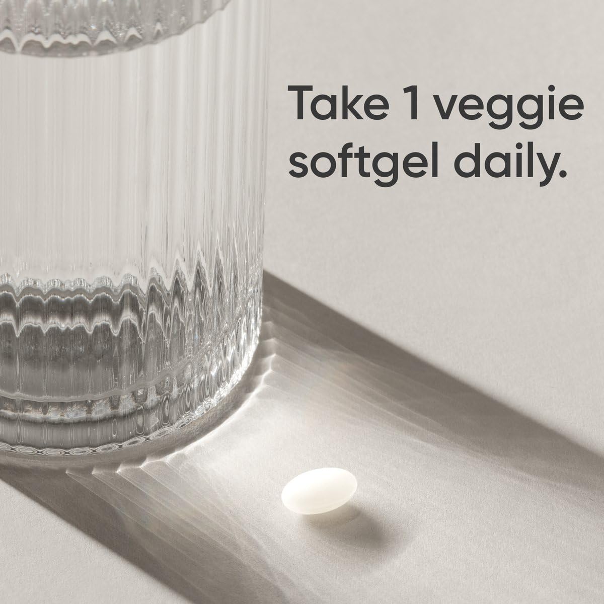 Sports Research Biotin with coconut oil encapsulated softgels showing premium ingredients for beauty support.