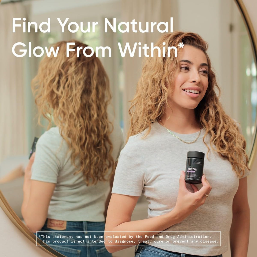 Sports Research Biotin glass bottle front showcasing label and vegan certification.