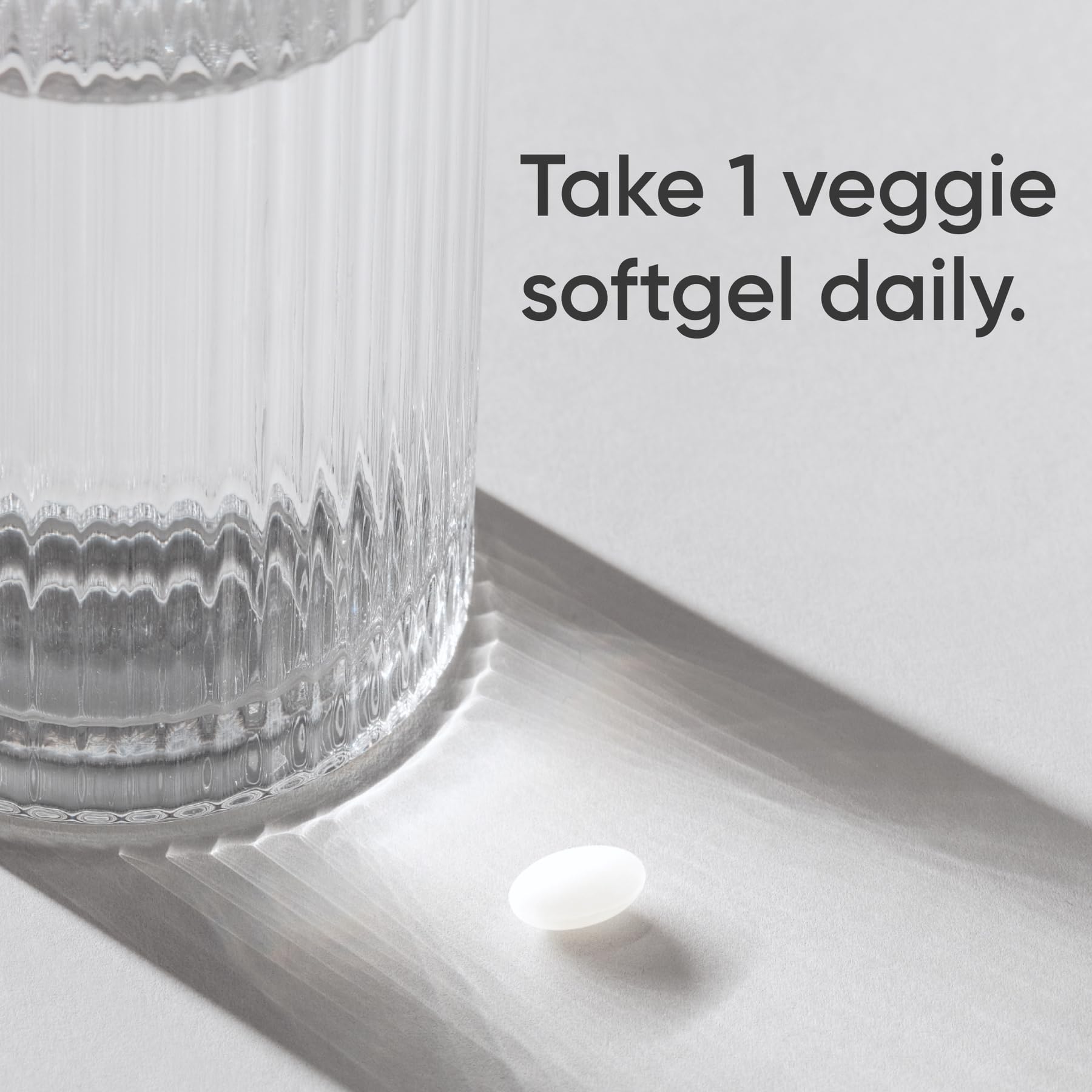 Label shows organic coconut oil base in Sports Research Biotin capsules.