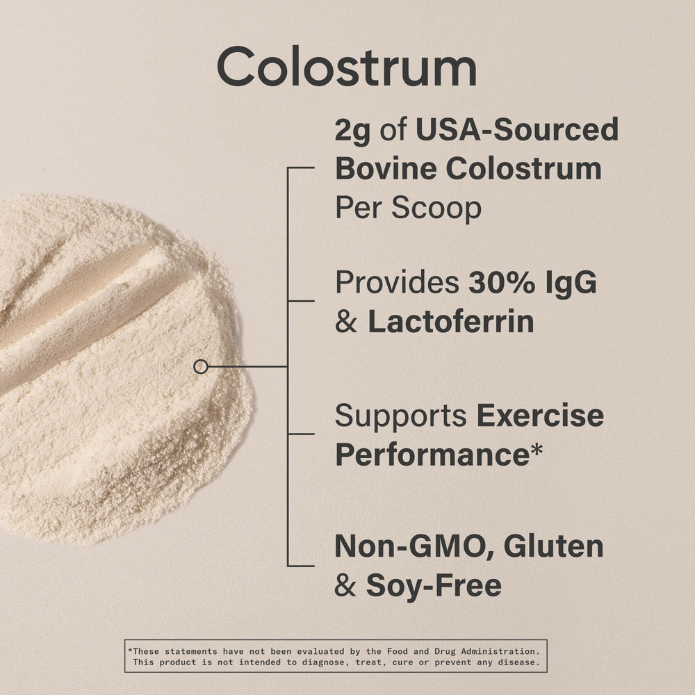 Sports Research colostrum powder bottle with label on kitchen counter.