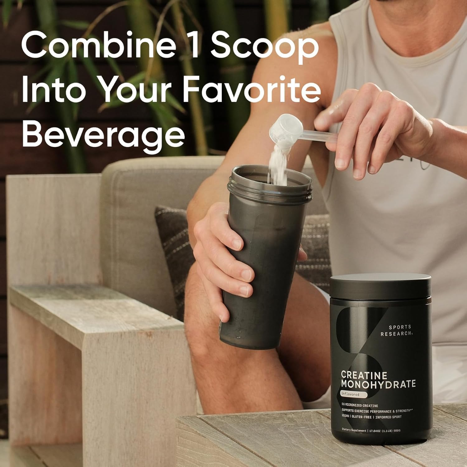 Sports Research Creatine Monohydrate being poured into cold drink
