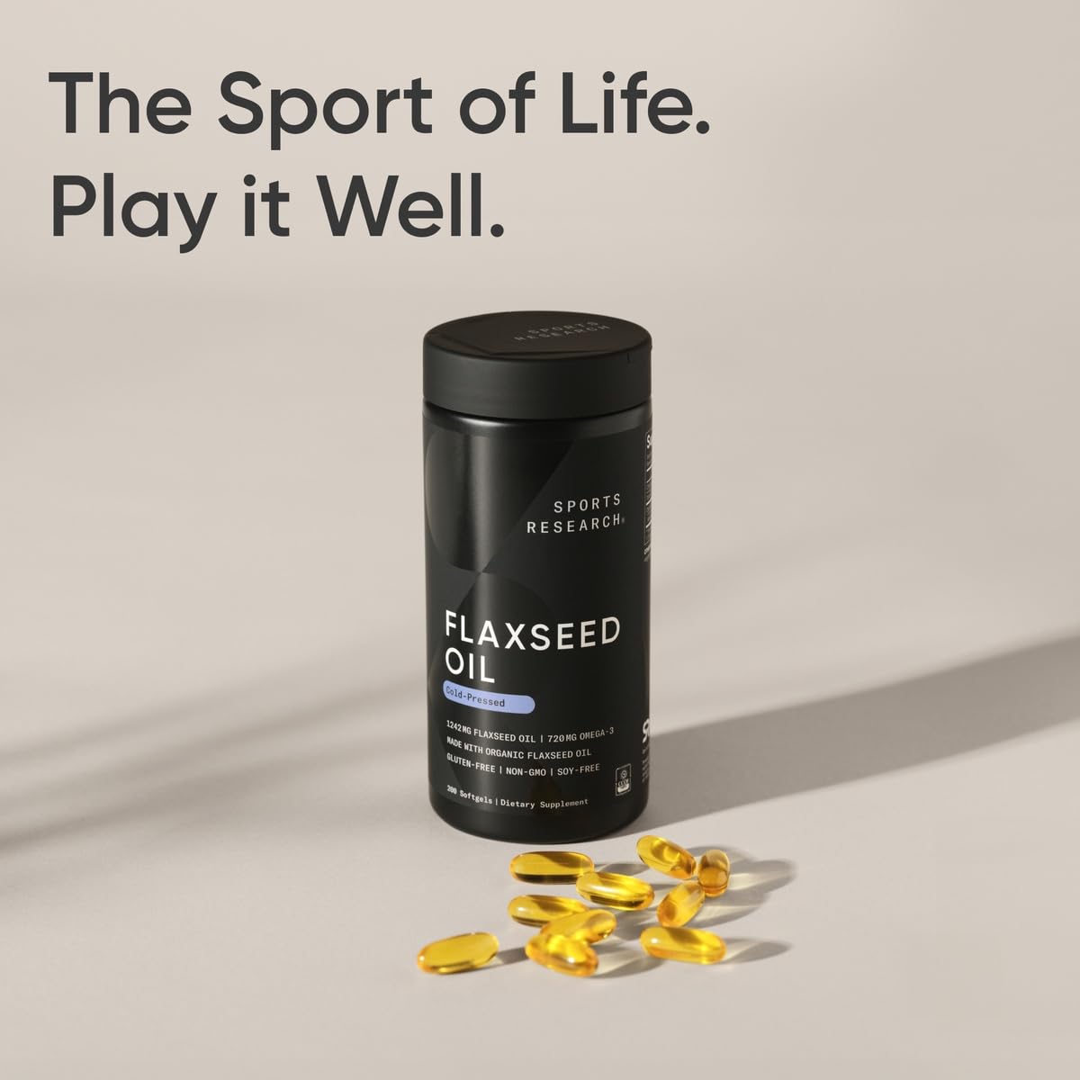 Close-up of smooth golden flaxseed oil softgels from Sports Research