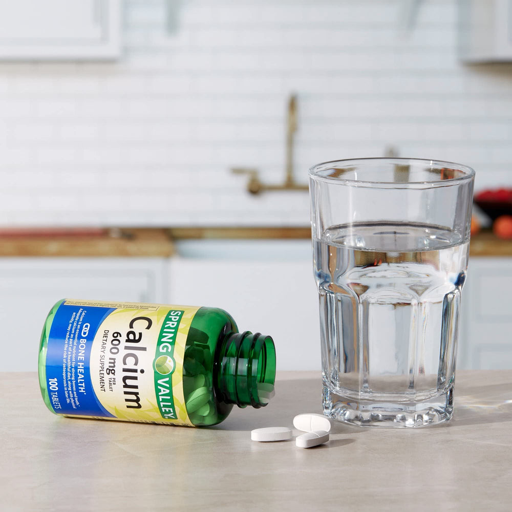 Spring Valley Calcium 600mg bottle pour image for dosing