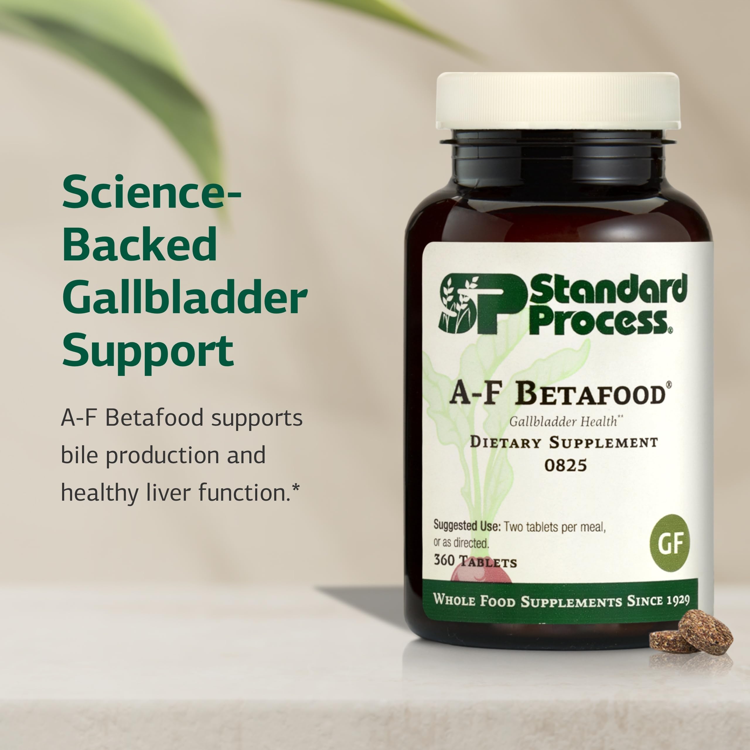 Pouring from the Betafood bottle highlights easy daily administration.