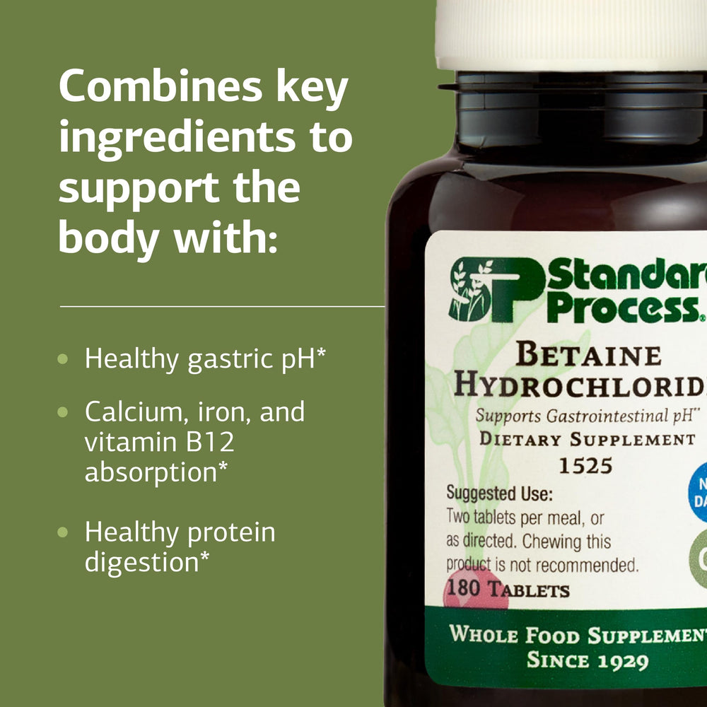 Betaine HCl tablets in hand showing portable digestive pH aid