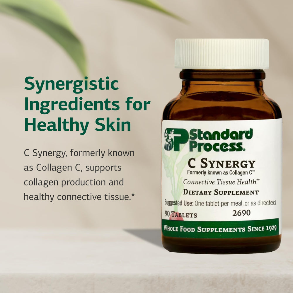 Standard Process C Synergy tablets close-up ready for daily use.