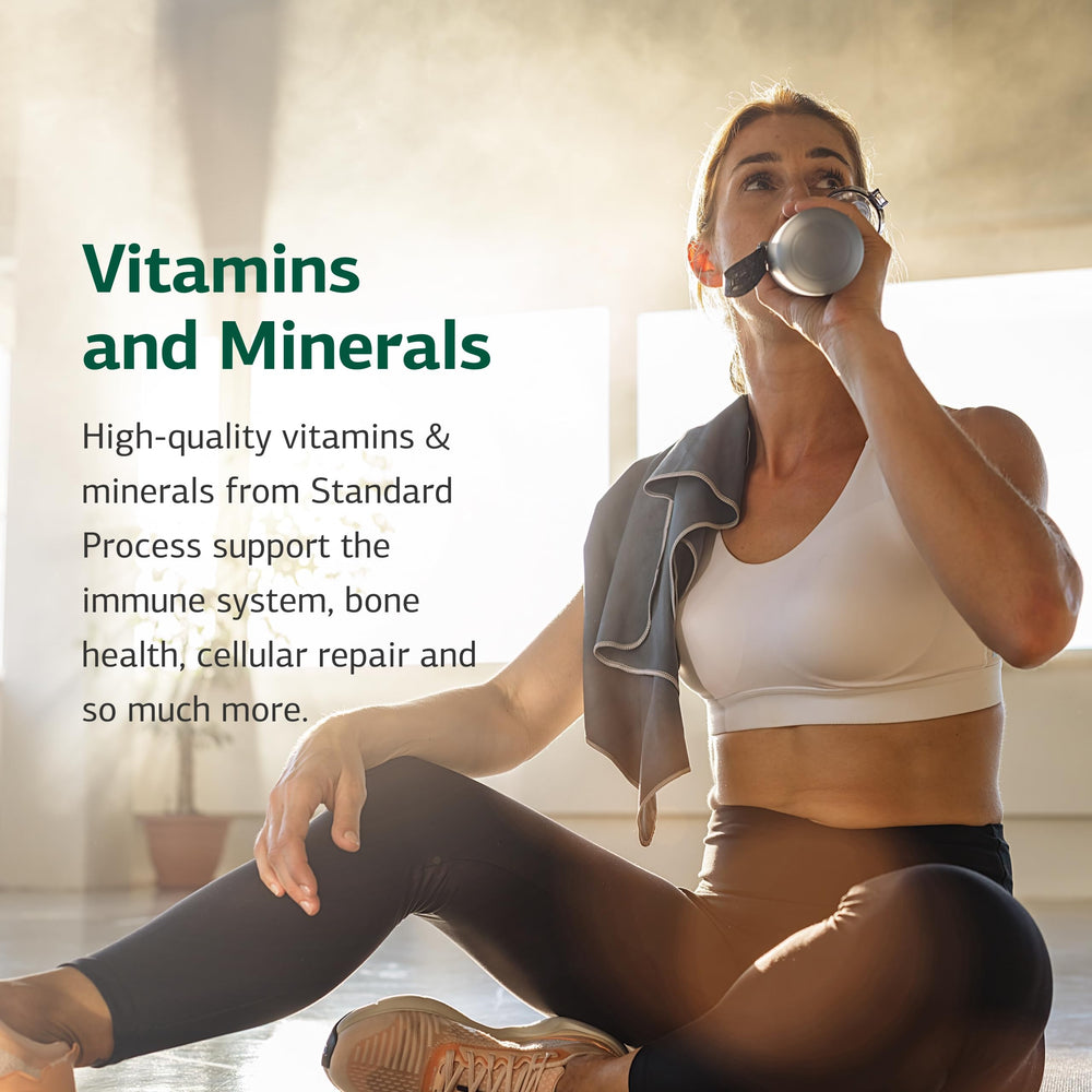 Standard Process Calcium Lactate Powder in a glass supports daily bone and blood health.