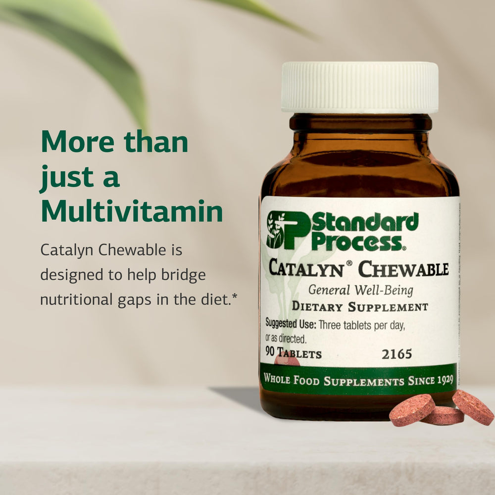 Standard Process Catalyn chewable tablets close-up highlighting vitamin-rich formulation.