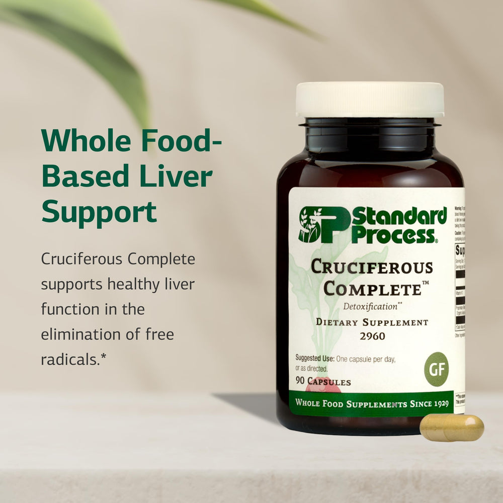 Standard Process Cruciferous Complete capsules ready for daily detox support.