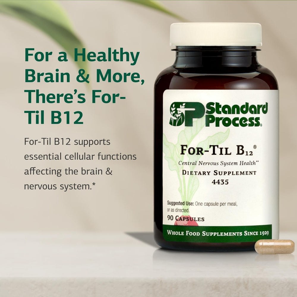 Standard Process For-Til B12 capsules close-up for cellular energy support.