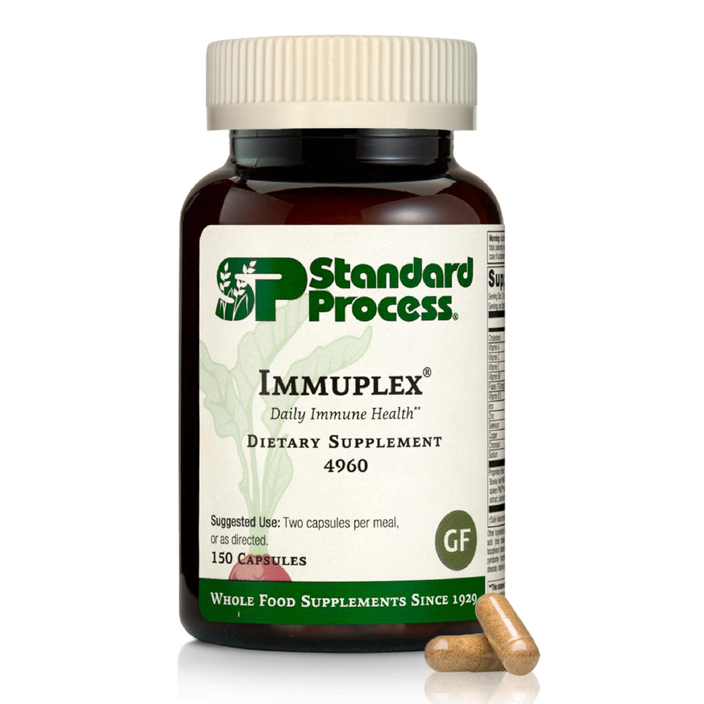 Standard Process Immuplex bottle showing daily immune support capsules.