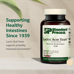 Label detail on Standard Process Lactic Acid Yeast bottle listing ingredients for gut support.
