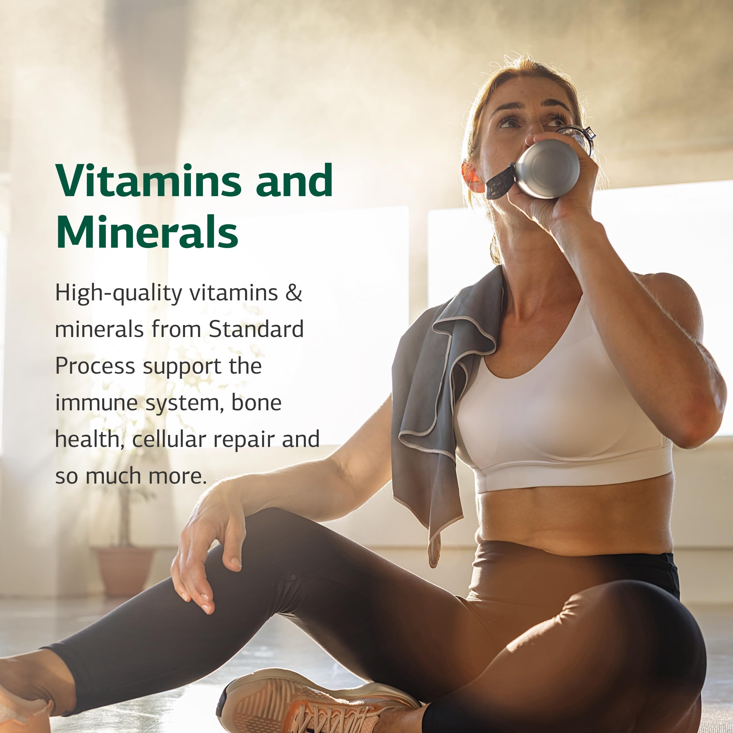 Standard Process Manganese B12 bottle near desk for on-the-go use.