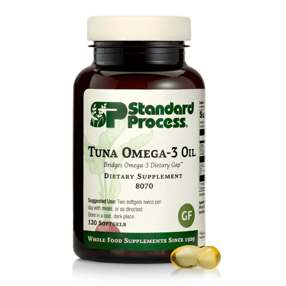 Standard Process Tuna Omega-3 Oil bottle label highlights non-concentrated tuna oil for brain and eye support