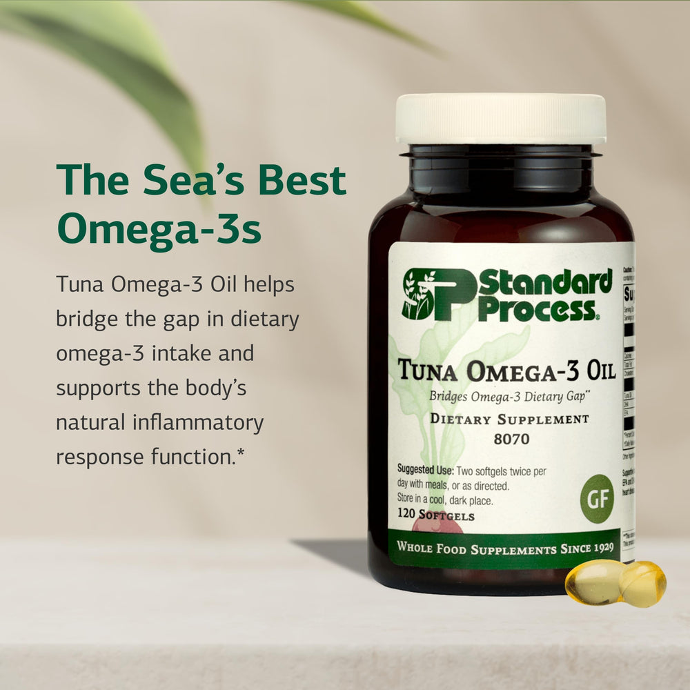 Standard Process Tuna Omega-3 Oil softgels pour demonstrates easy daily intake for health support