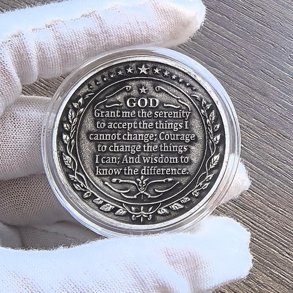 Strugglejewelry Serenity Prayer meditation coin highlighting calm focus.
