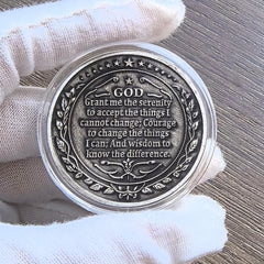Strugglejewelry Serenity Prayer meditation coin highlighting calm focus.