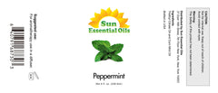 Peppermint oil in a bottle for diffuser setup to lift mood and focus