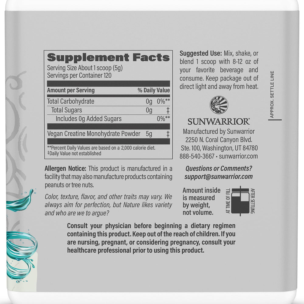 Scoop of Sunwarrior creatine monohydrate powder showing micronized texture for quick mixing