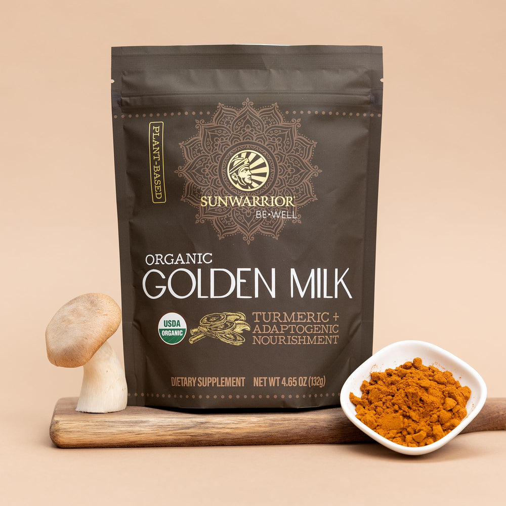 Sunwarrior Golden Milk Powder ingredients close‑up showing turmeric and mushrooms.
