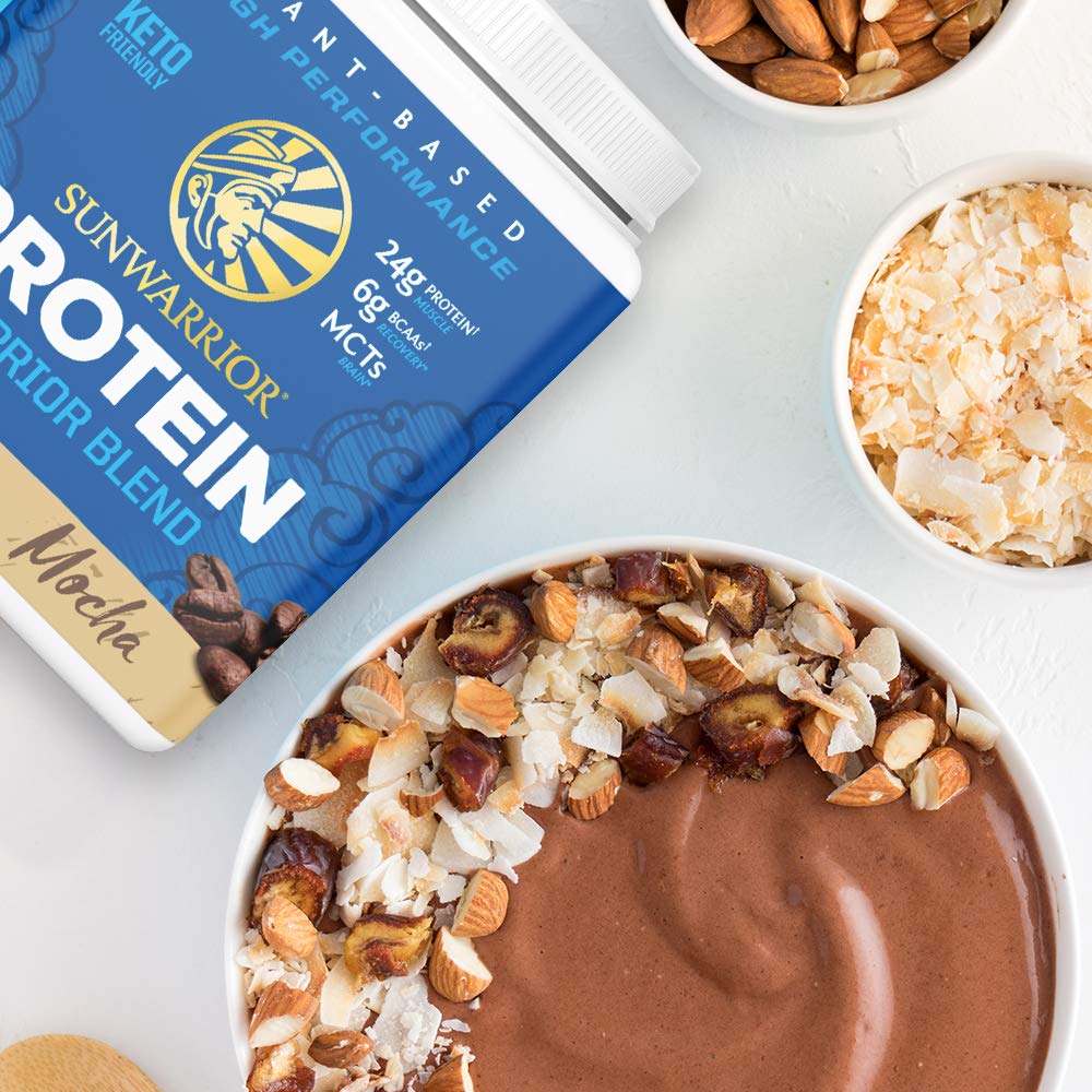 Sunwarrior mixed shake with mocha powder, showcasing creamy texture.