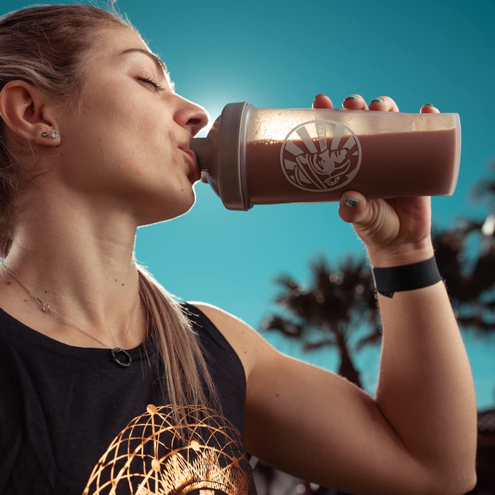 Sunwarrior organic protein mocha froth in glass, suggesting energizing daily use.