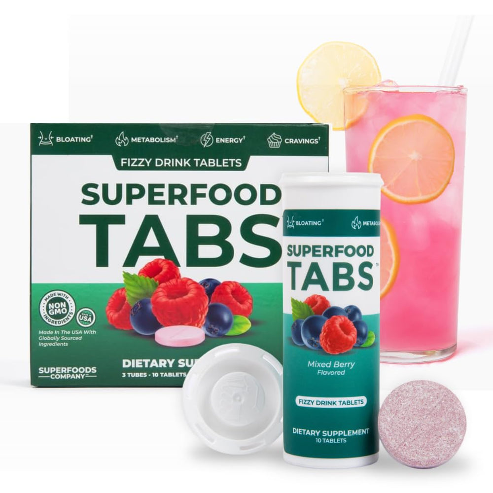 Fresh berries swirl with the Detox drink to emphasize mixed berry flavor