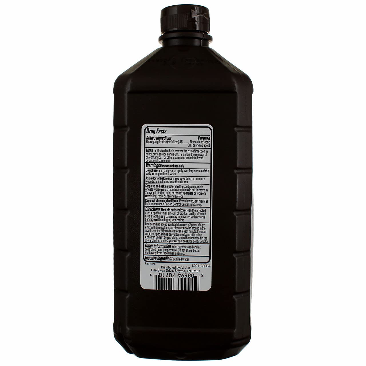 Swan 32oz bottle shows clear liquid and label details