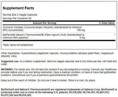 Swanson Curcumin Complex capsules closeup showing vegetarian, non-GMO formulation