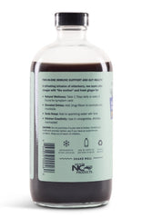 Sweet's Elderberry Shrub organic ingredients with elderberry and ginger on label.