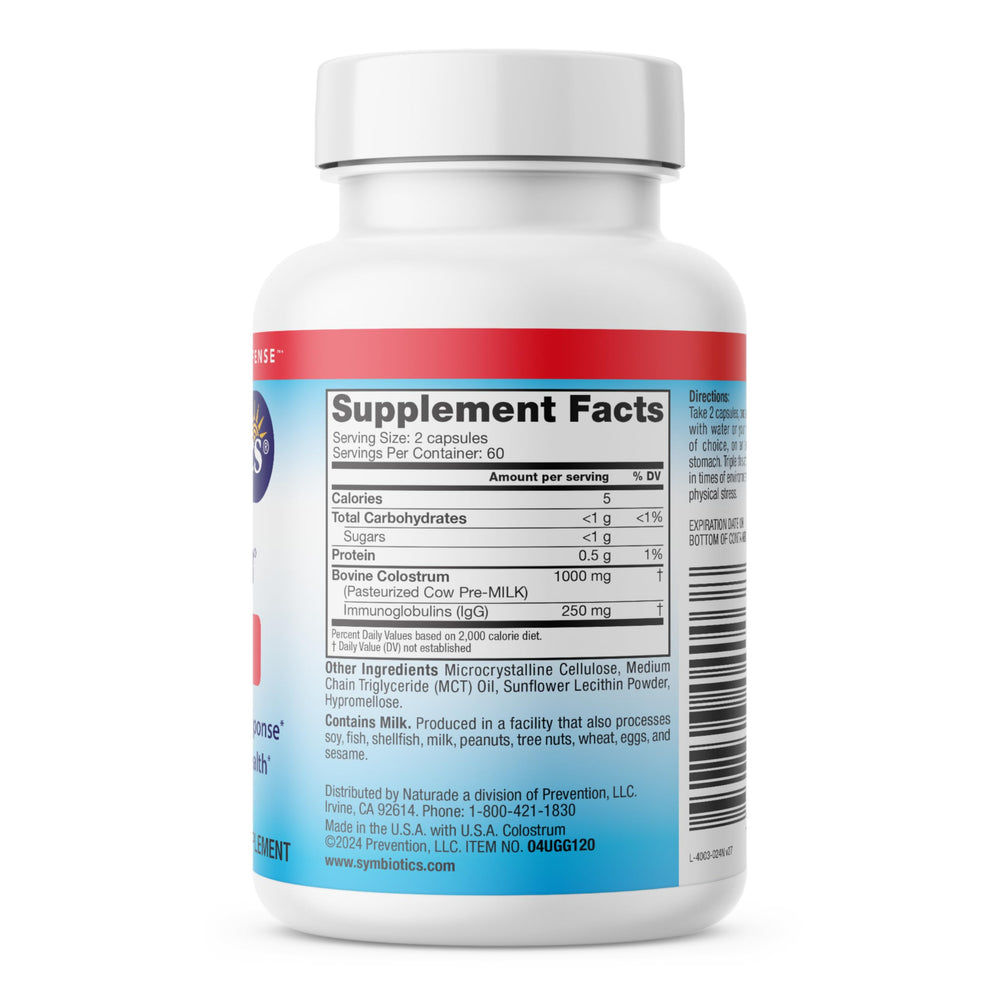 Symbiotics Colostrum bottle shown in travel-friendly setup.