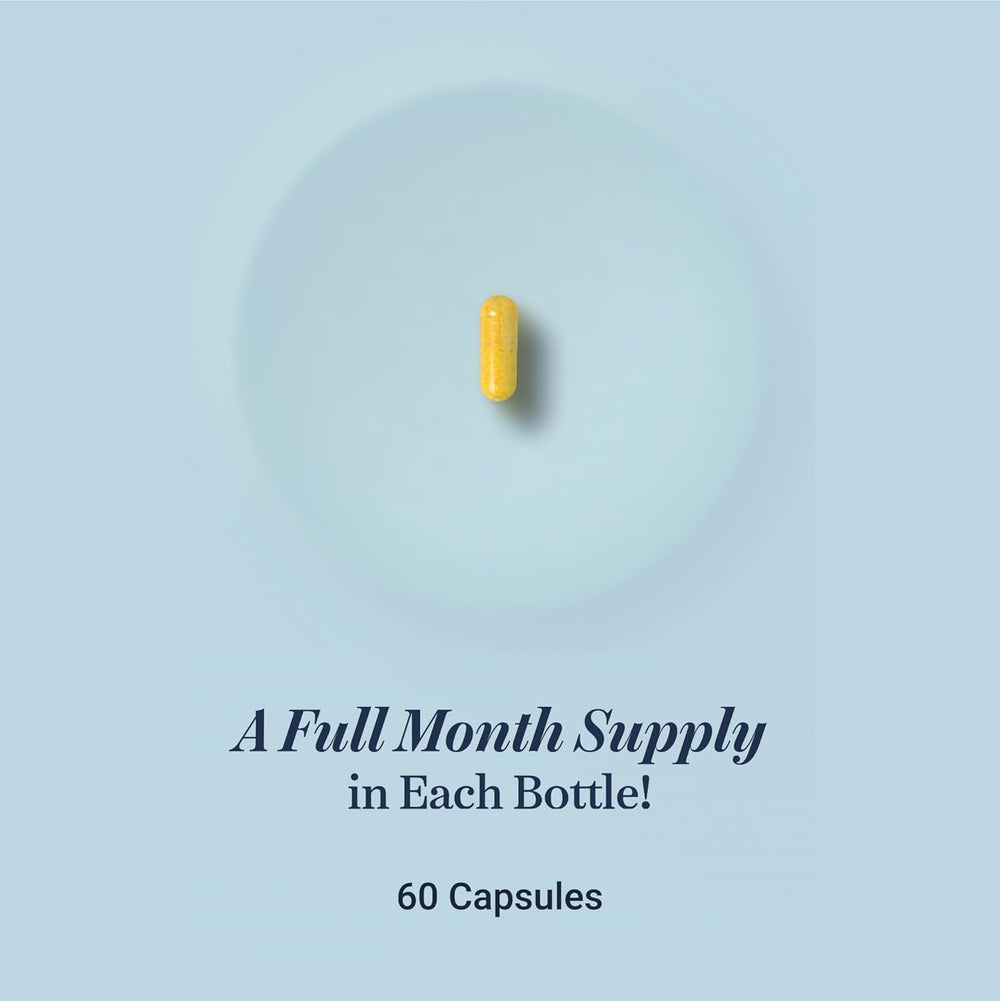 Capsules held in hand illustrating portable joint support