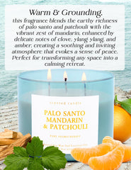 T&amp;H Palo Santo Mandarin Patchouli candle with three cotton wicks burning for balanced glow.
