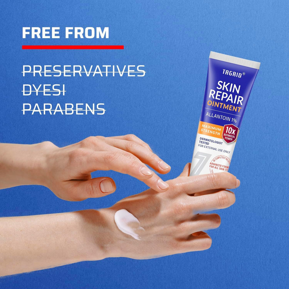 TAGRID Skin Repair Ointment tube ready for daily use next to towels.