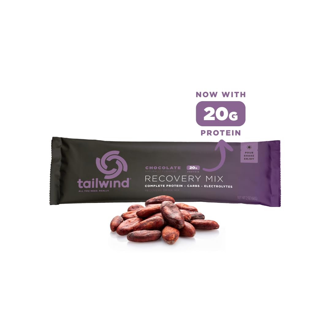 Tailwind Recovery Mix in bottle being stirred for on-the-go hydration